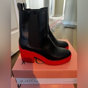 Wild Paid black Ankle boots w/red heel. Size 9. I wear a 10 & sized down to a 9